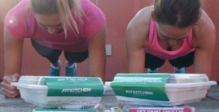 Two girls doing plank