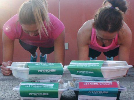 Two girls doing plank